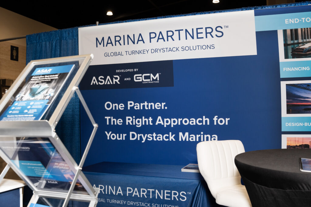 Marina partners networking at the trade show, showcasing collaboration in the maritime industry.
